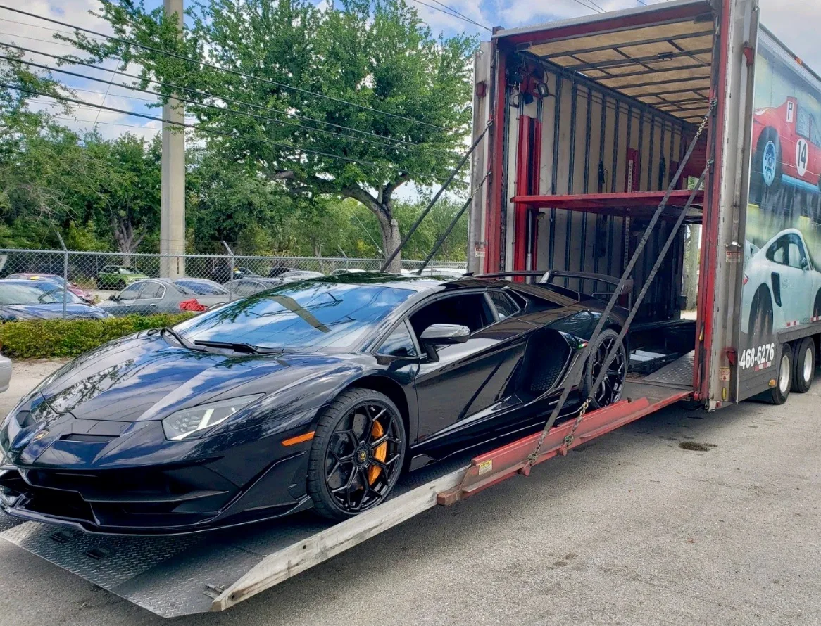Auto transport open vs enclosed transport: which should you choose? with National Auto Transport